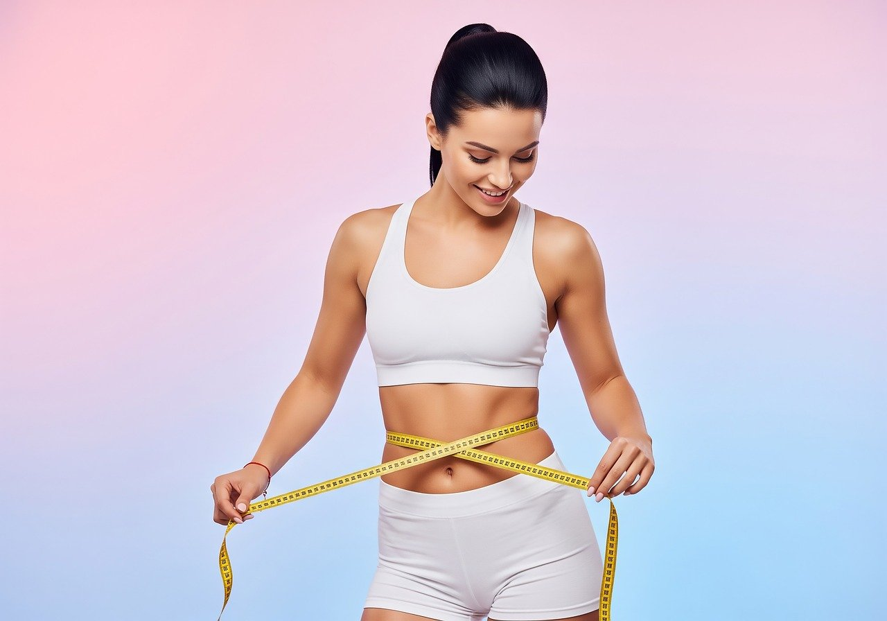 fitness, weight loss, healthy lifestyle, diet, body measurement, measuring tape, waist, slender, athletic, woman, white sportswear, sports bra, shorts, smiling, achievement, body goal, studio shot, gradient background, wellness, progress, ai generated