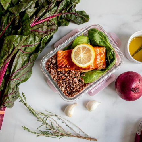 sliced orange fruit on white ceramic plate
