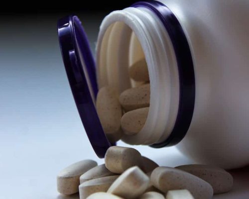 oval white medication pills