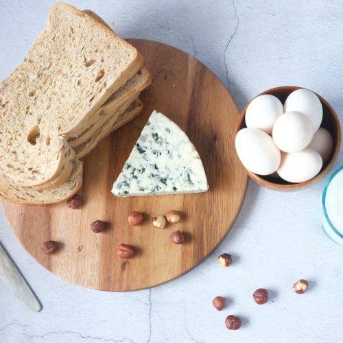 sliced bread on brown wooden chopping board